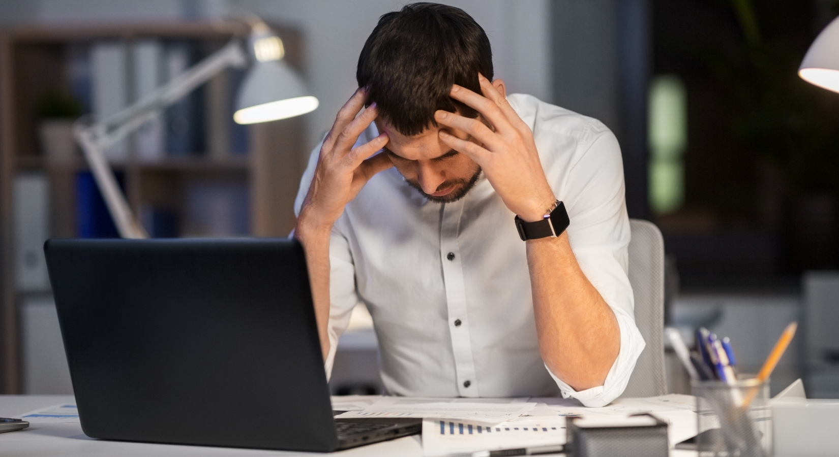 Frustrated operator dealing with too many systems.
