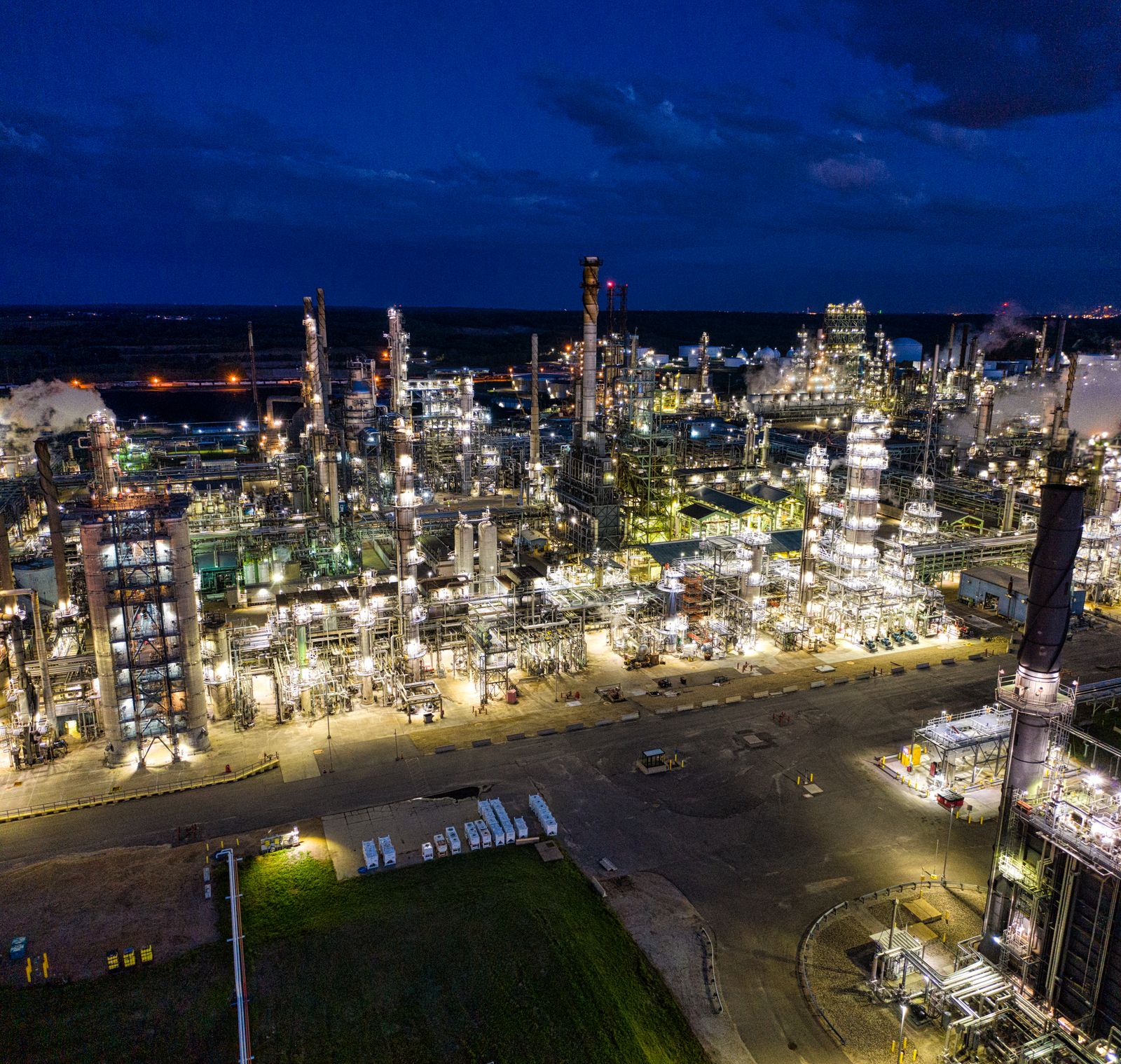 Refinery lit at dusk