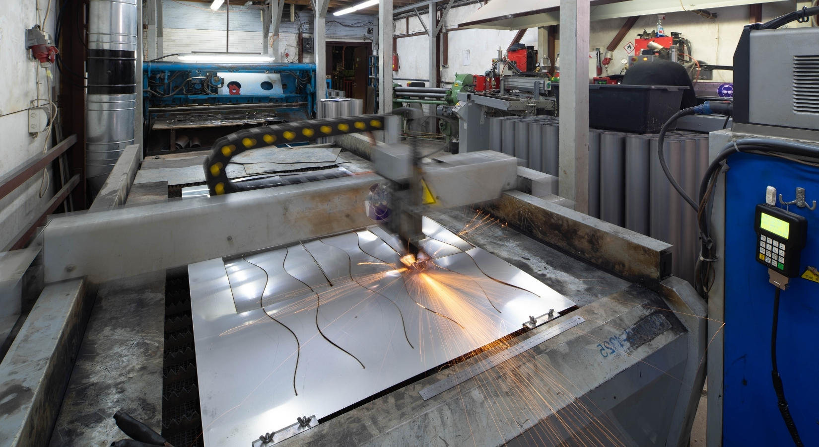 Sheet metal fabrication table and formed duct work.