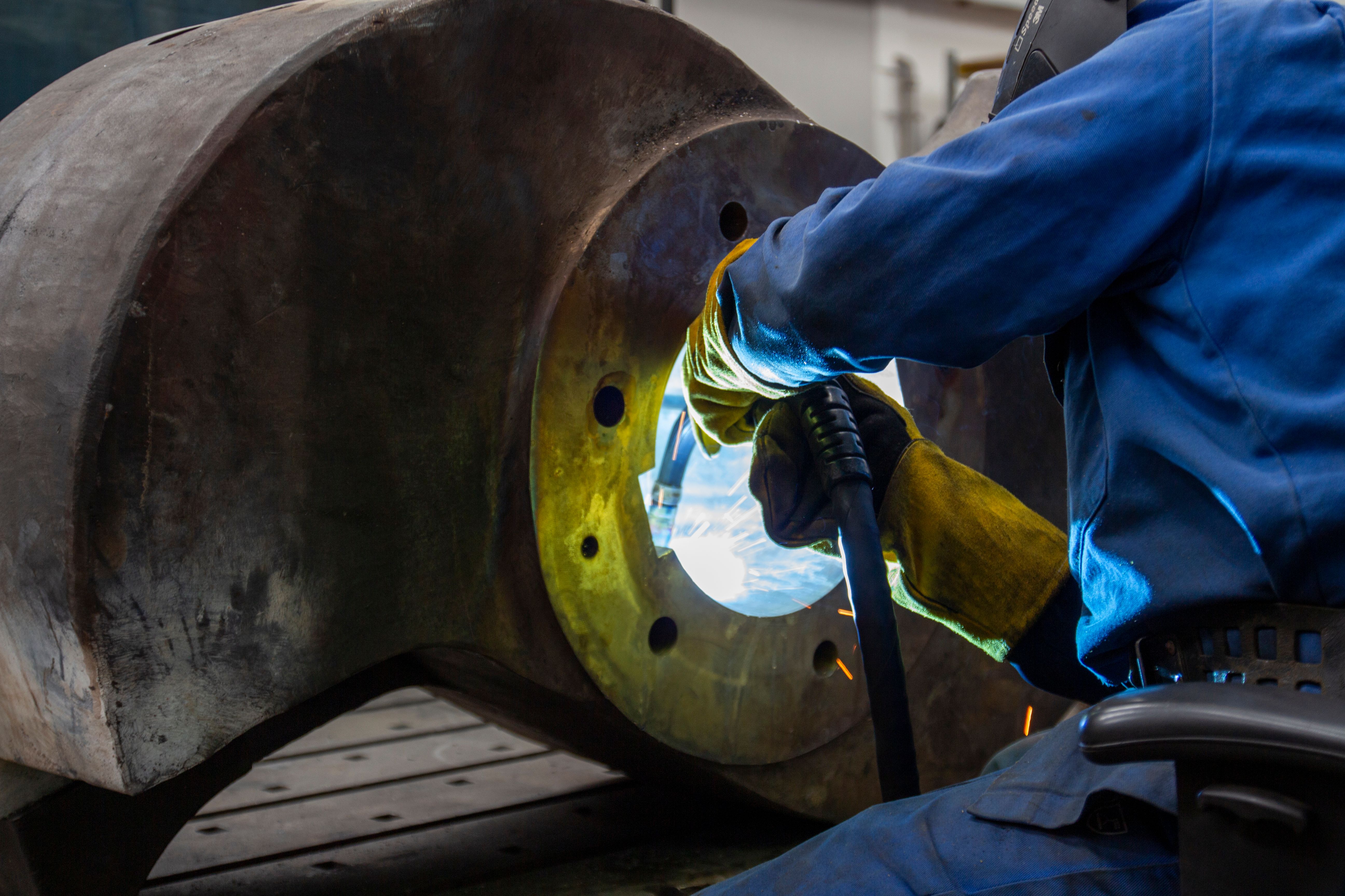 Pipe welding and fabrication on the shop floor.